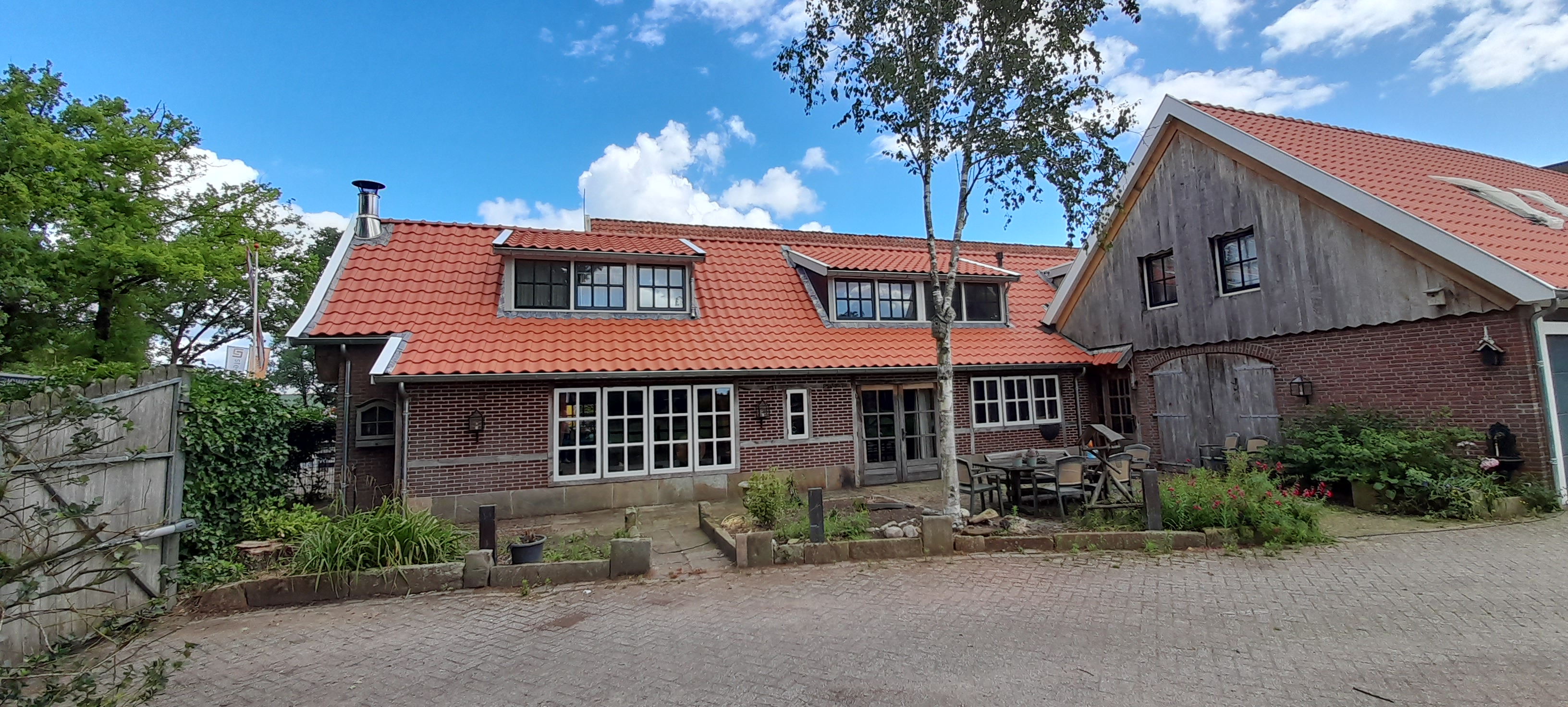 Restauratie en verduurzaming hellend dak en dakkapellen Weerselo fase 1